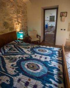 A bed or beds in a room at Il Flauto Magico