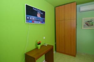 TV a/nebo společenská místnost v ubytování Bourlis Apartments
