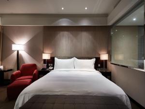 Katil atau katil-katil dalam bilik di The Tango Hotel Taipei XinYi