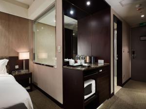 Katil atau katil-katil dalam bilik di The Tango Hotel Taipei XinYi