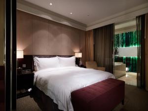 Katil atau katil-katil dalam bilik di The Tango Hotel Taipei XinYi