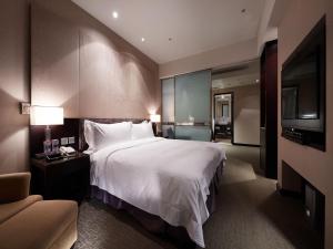 Katil atau katil-katil dalam bilik di The Tango Hotel Taipei XinYi