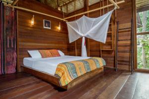 Ein Bett oder Betten in einem Zimmer der Unterkunft Castaway Resort Koh Lipe