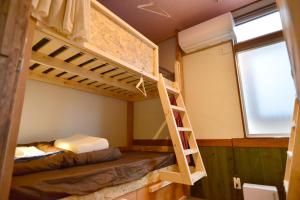Postel nebo postele na pokoji v ubytování Good Trip Hostel & Bar
