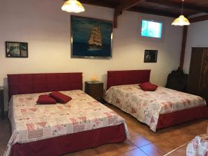 เตียงในห้องที่ Casa vacanze Porto Selvaggio