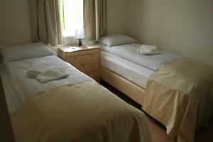 Katil atau katil-katil dalam bilik di Guesthouse Stekkatún