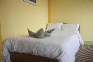 Ένα ή περισσότερα κρεβάτια σε δωμάτιο στο Hotel Yala Peak
