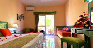 Ένα ή περισσότερα κρεβάτια σε δωμάτιο στο Silver Beach Hotel