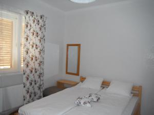 Postel nebo postele na pokoji v ubytování Villa Ani + 19 fotografií