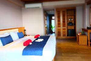Ein Bett oder Betten in einem Zimmer der Unterkunft Koh Ma Beach Resort - SHA Extra Plus