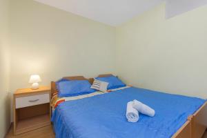 Postel nebo postele na pokoji v ubytování Bulat Sea View Apartments