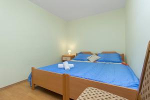 Postel nebo postele na pokoji v ubytování Bulat Sea View Apartments