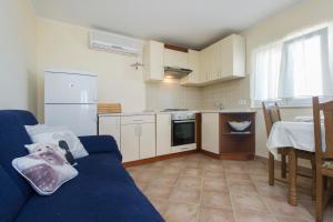 Kuchyň nebo kuchyňský kout v ubytování Bulat Sea View Apartments