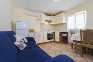 Kuchyň nebo kuchyňský kout v ubytování Bulat Sea View Apartments