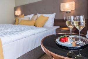 Postel nebo postele na pokoji v ubytování Hotel Thermalpark