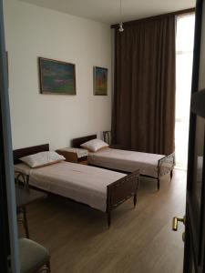 Postel nebo postele na pokoji v ubytování Art Guesthouse