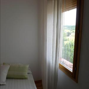 Cama o camas de una habitación en Casa Les Germanes