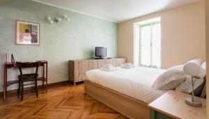 Posteľ alebo postele v izbe v ubytovaní Italianway-Lazzaro Palazzi