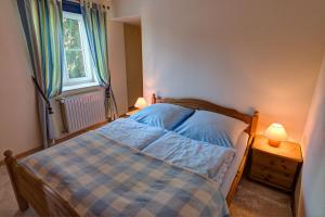 Postel nebo postele na pokoji v ubytování Landhaus Angelika