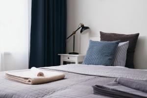 Posteľ alebo postele v izbe v ubytovaní Apartment Gesse Jirsikova