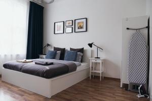 Posteľ alebo postele v izbe v ubytovaní Apartment Gesse Jirsikova