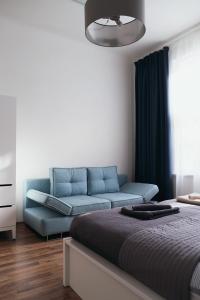Posteľ alebo postele v izbe v ubytovaní Apartment Gesse Jirsikova
