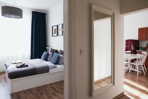 Posteľ alebo postele v izbe v ubytovaní Apartment Gesse Jirsikova