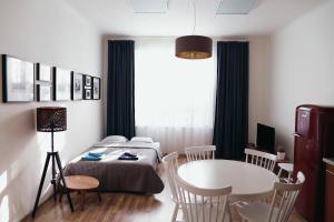 Posteľ alebo postele v izbe v ubytovaní Apartment Gesse Jirsikova