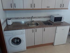 Kuchyňa alebo kuchynka v ubytovaní Fan Flat Torremolinos