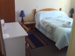 Postel nebo postele na pokoji v ubytování Lenard Charles Bed & Breakfast