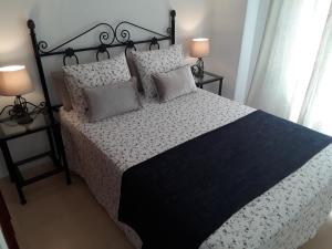 Posteľ alebo postele v izbe v ubytovaní Fan Flat Torremolinos