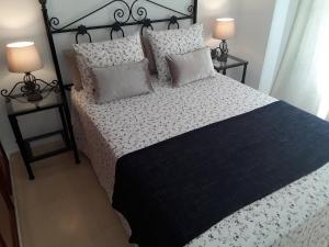 Posteľ alebo postele v izbe v ubytovaní Fan Flat Torremolinos