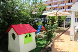 Aed väljaspool majutusasutust Hotel Itta