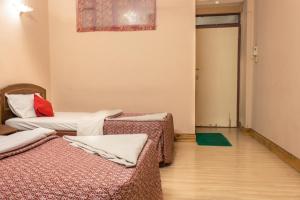 Voodi või voodid majutusasutuse Hotel Kamal toas