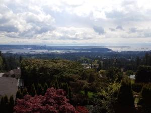 a view of a lake from the top of a hill at Emperial Suites in North Vancouver