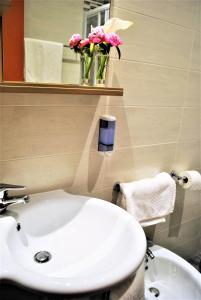 Koupelna v ubytování Hotel Picobello Pineta
