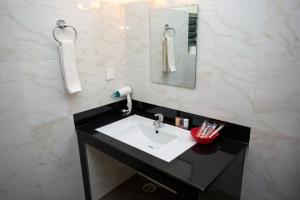 Een badkamer bij Hotel Spring