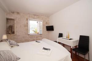 Guest House Holiday客房内的一张或多张床位