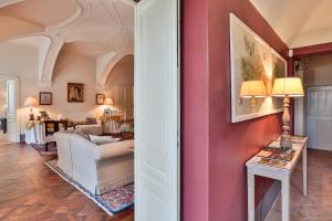 a living room with a couch and a table at Relais di Tenuta Santa Caterina B&B in Grazzano Badoglio +20 photos