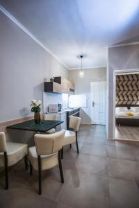 Kuchyň nebo kuchyňský kout v ubytování Jázmin Apartman