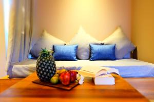 Ein Bett oder Betten in einem Zimmer der Unterkunft Koh Ma Beach Resort - SHA Extra Plus