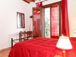 Postel nebo postele na pokoji v ubytování Agriturismo Il Rustico