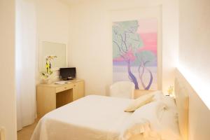 Кровать или кровати в номере Hotel Rosmarina