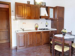 Kuchyň nebo kuchyňský kout v ubytování Agriturismo Il Rustico