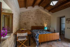 A bed or beds in a room at Il Flauto Magico