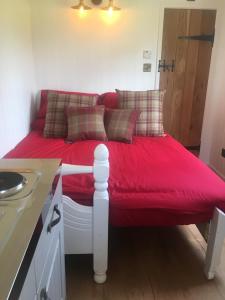 A bed or beds in a room at Orme View Lodges
