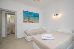 Posteľ alebo postele v izbe v ubytovaní Aphrodite Luxury Apartments