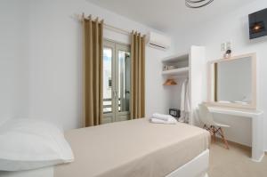 Posteľ alebo postele v izbe v ubytovaní Aphrodite Luxury Apartments