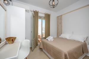 Posteľ alebo postele v izbe v ubytovaní Aphrodite Luxury Apartments