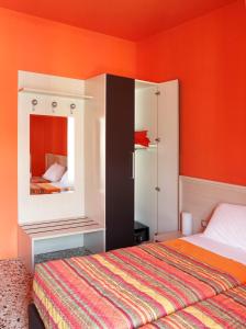 Un pat sau paturi într-o cameră la SoloSonno